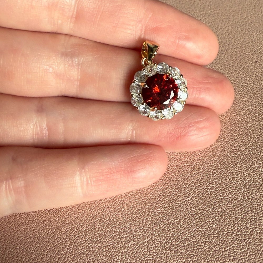 Radiant Gold and Red Gemstone necklace made in a Freida Rothman factory